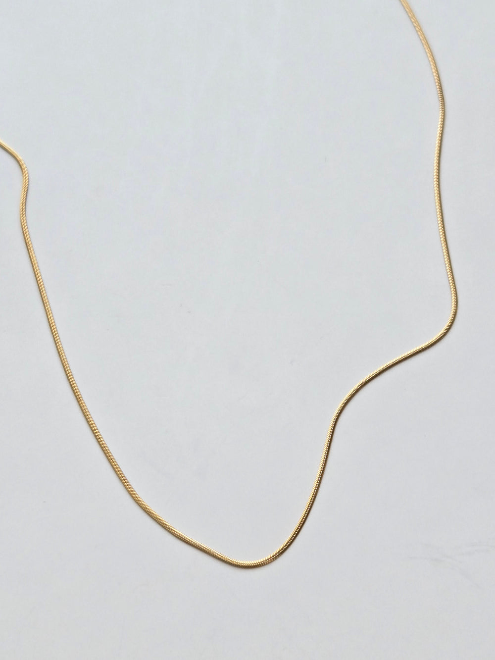 061 | gold thin snake chain