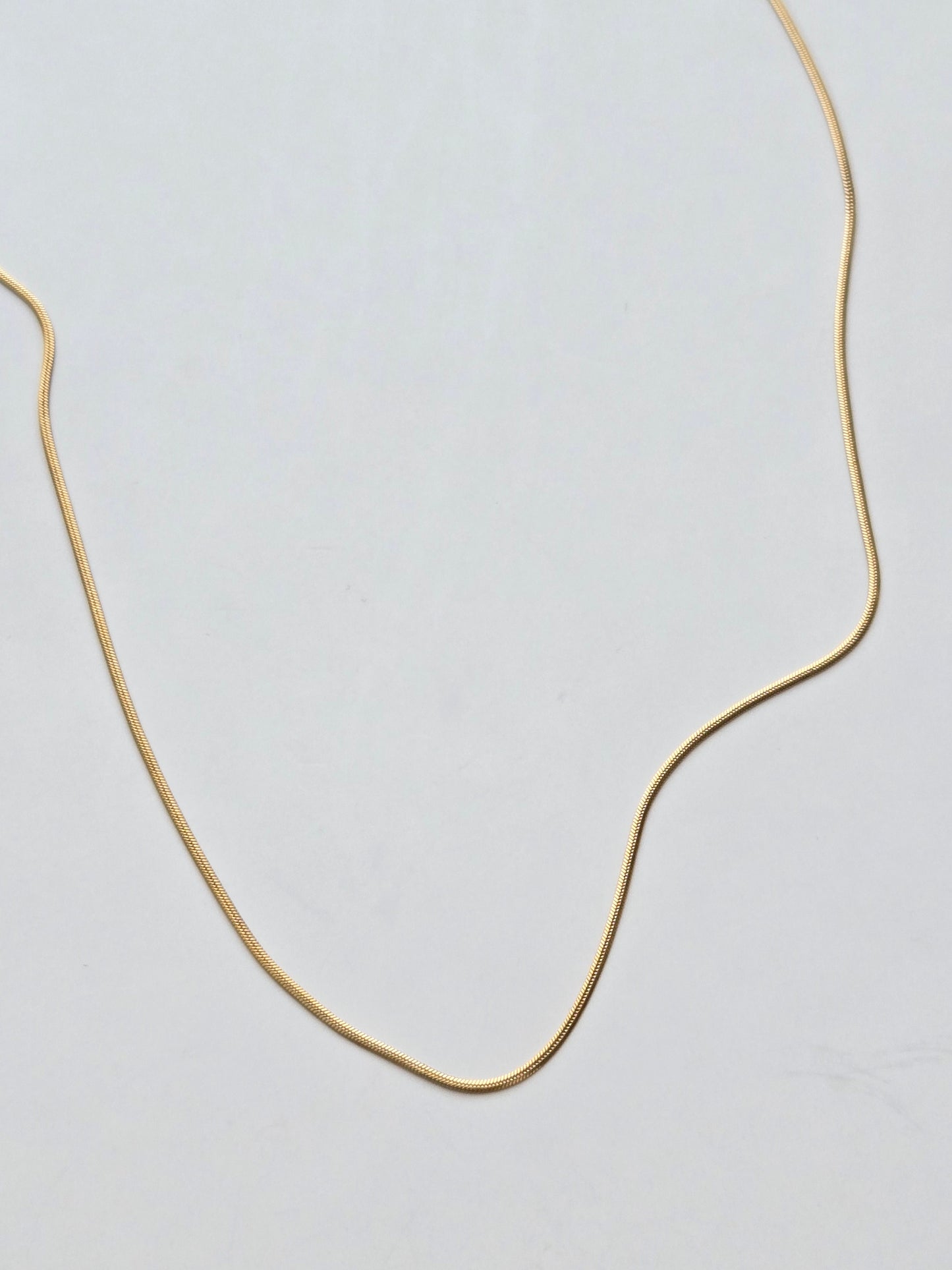 061 | gold thin snake chain